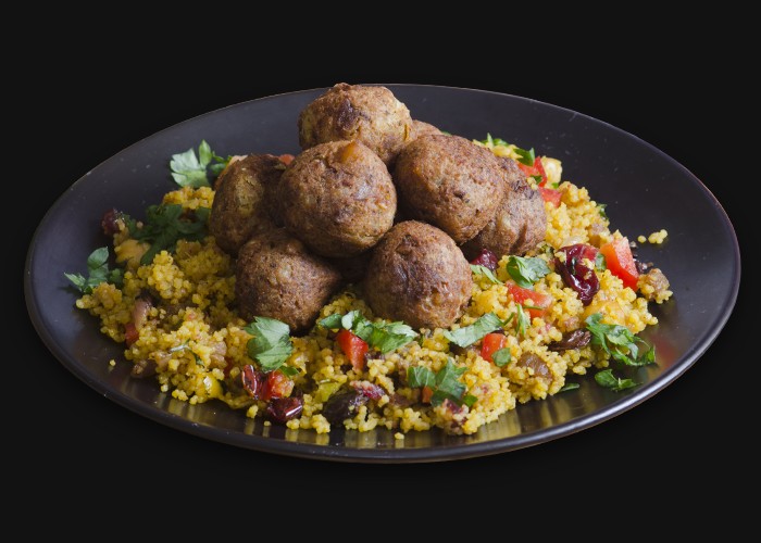 Couscous with broth and beef patty.