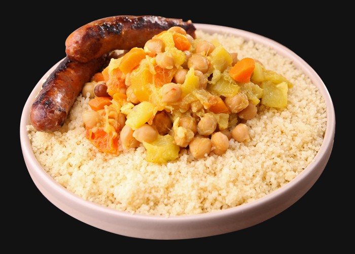 Couscous with broth and merguez.