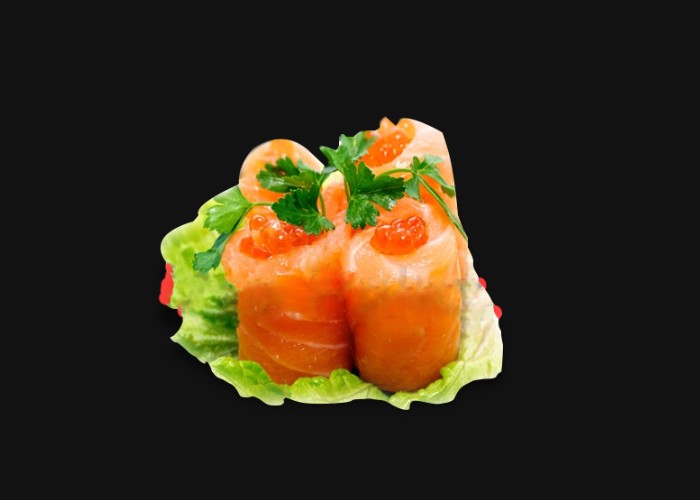 Salmon eggs coated with a slice of salmon.